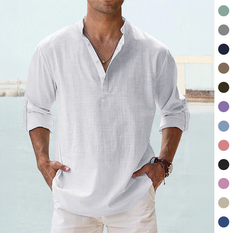 Men's white linen shirt with rolled sleeves, V-neck, and relaxed fit, ideal for casual summer wear.