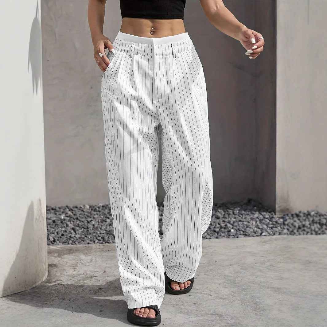 White pinstripe wide-leg pants with high waist, worn with black crop top and sandals